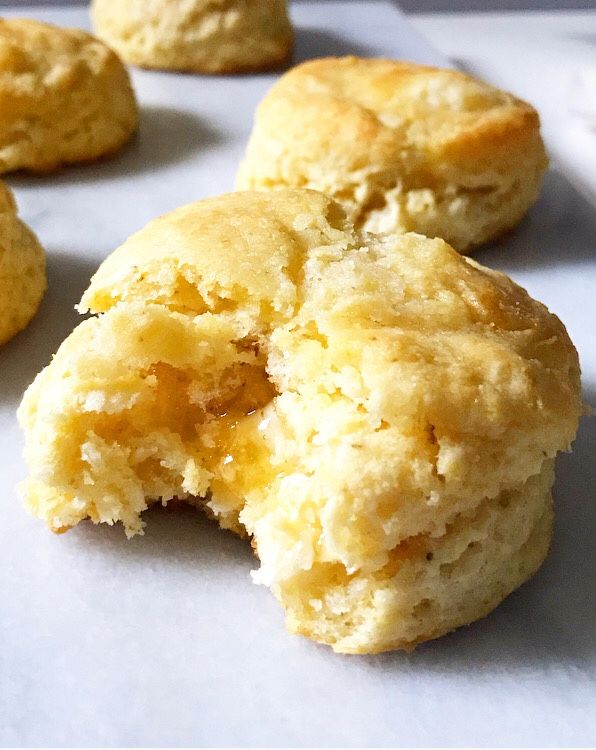 some biscuits are sitting on a white surface