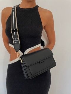 Introducing the newest addition to your collection - the stunning Senza handbag! ❤️ Shop now ➡️ www.valentinaandrose.com/en-au/products/the-camilla-handbag-black?_pos=1&_sid=f19514c6b&_ss=r Its sleek design and versatile style make it the perfect accessory for any occasion. From brunch with the girls to date night with bae, this bag has got you covered. #handbaglove #fashionaddict #bagobsessed #styleinspiration #shopaholic #newbagalert #musthaveaccessory #luxury Black Crossbody Box Bag With Top Carry Handle, Black Crossbody Shoulder Bag With Detachable Strap, Luxury Crossbody Bag With Gunmetal Hardware, High-end Black Crossbody Box Bag, Rose Handbag, Black Valentino Crossbody Bag, Black Handbags, Fashion Addict, Leather Material