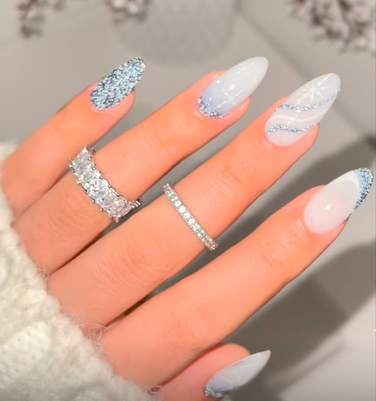 Nails Xmas 2023, Blue Nails Christmas Designs, Light Blue With Snowflake Nails, Almond Nails Winter Design, Winter Wonderland Nails Blue, Blue Glitter Winter Nails, Snow Inspired Nails, Winter Nails Blue Snowflakes, Frosted Nails Winter