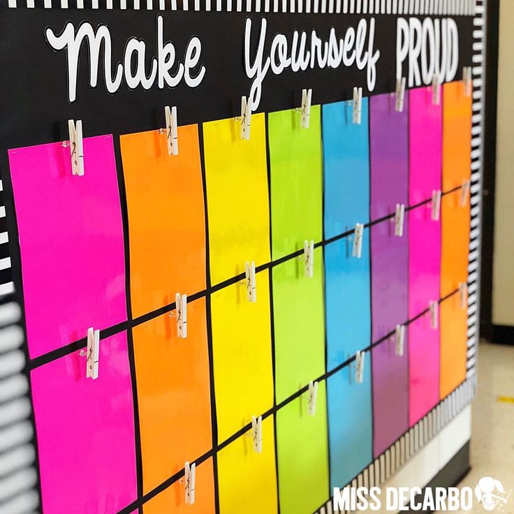 a colorful bulletin board with sticky notes on it