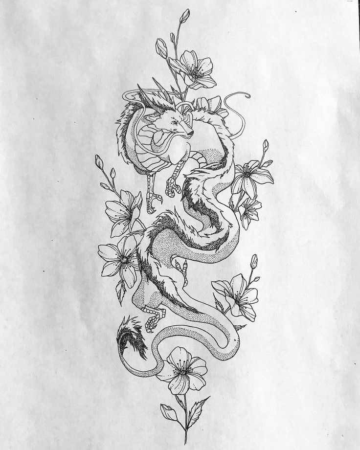 a drawing of a dragon and flowers on paper