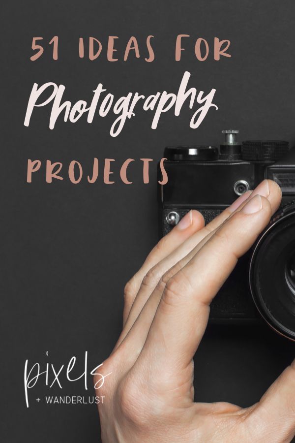 a person holding a camera with the words 51 ideas for photography projects