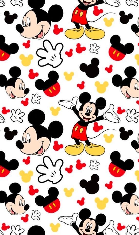 mickey and minnie mouse pattern on white background