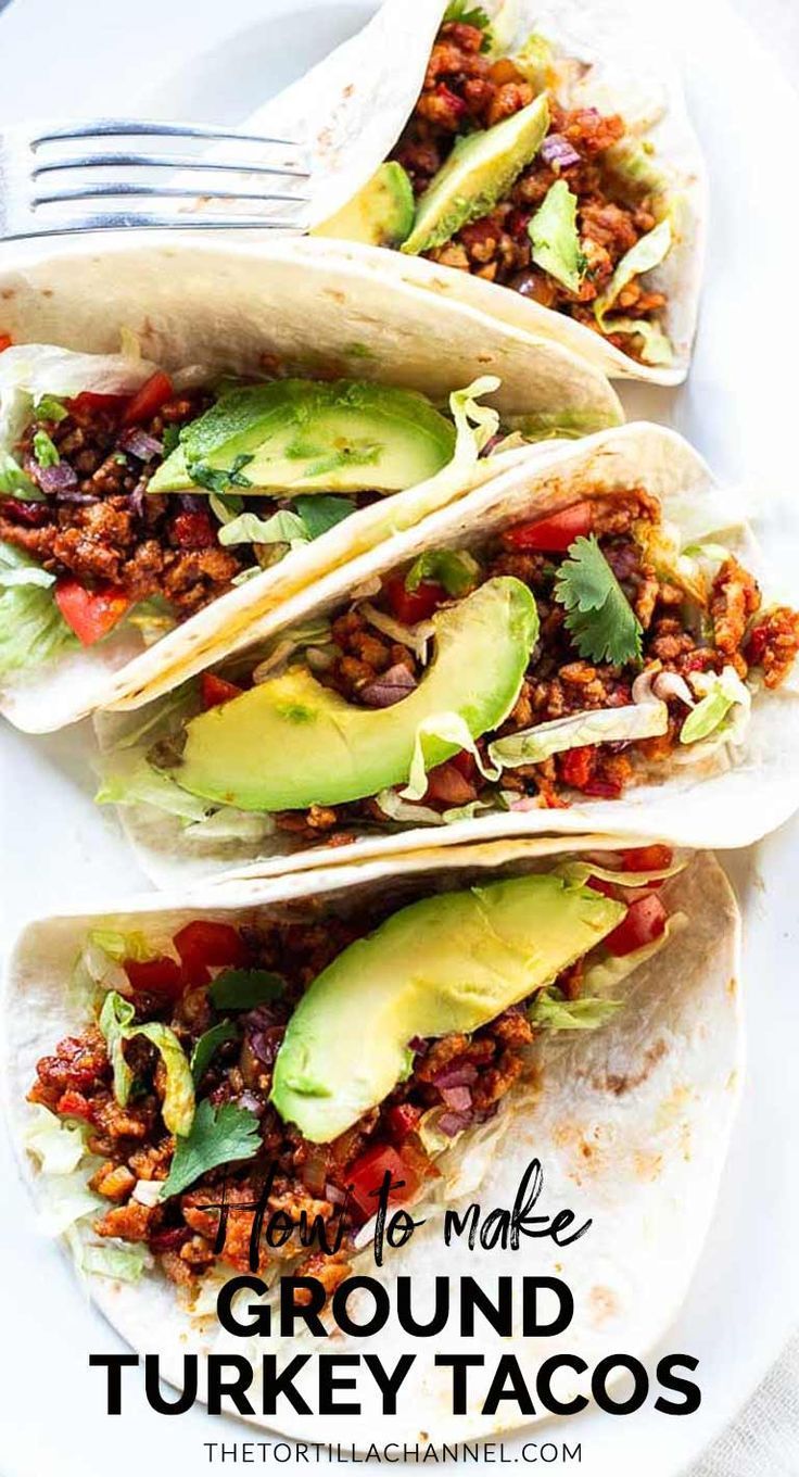 three ground turkey tacos on a white plate