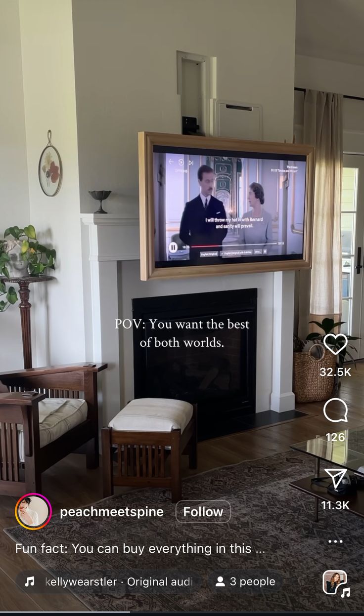 a flat screen tv sitting above a fireplace in a living room