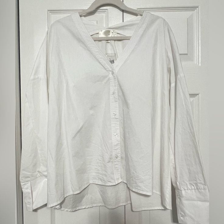 New With Tags, White Button Down Blouse With Double Buttons On Cuffs V-neck Top With Button Cuffs For Day Out, Cotton Button-up Shirt For Brunch, White Tops With Button Cuffs For Day Out, V-neck Tops With Button Cuffs For Daywear, V-neck Top With Button Cuffs For Daywear, Button-up Shirt For Brunch, Button-up Shirt With Button Closure For Brunch, V-neck Tops With Button Cuffs For Day Out, Cotton Button-up Blouse For Brunch