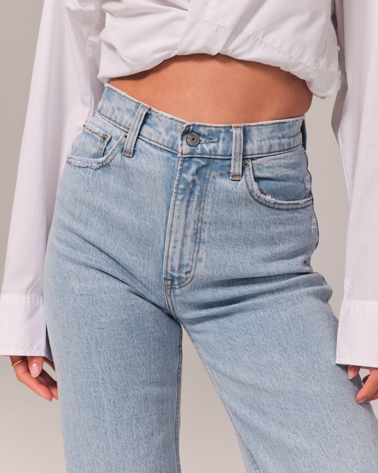 Evoke the nostalgia of the 90s with these Abercrombie & Fitch High Rise Relaxed Jeans, designed to flatter and comfort. These jeans are a modern twist on a classic style, perfect for today's fashion-forward woman.

- Size: 35L
- Color: Light Indigo
- Material: Cotton, Elastane
- Gender: Female
- Style: High rise, relaxed fit with a slim top and wider leg
- Features: Full-length leg, frayed hem

Ideal for casual outings or stylish lounging, these jeans pair effortlessly with your favorite tees or 90s Relaxed Jeans, High Rise 90s Relaxed Jean, Female Style, Women's Bottoms, Relaxed Jeans, Jeans Light, Pocket Bag, Light Wash Denim, Casual Tee