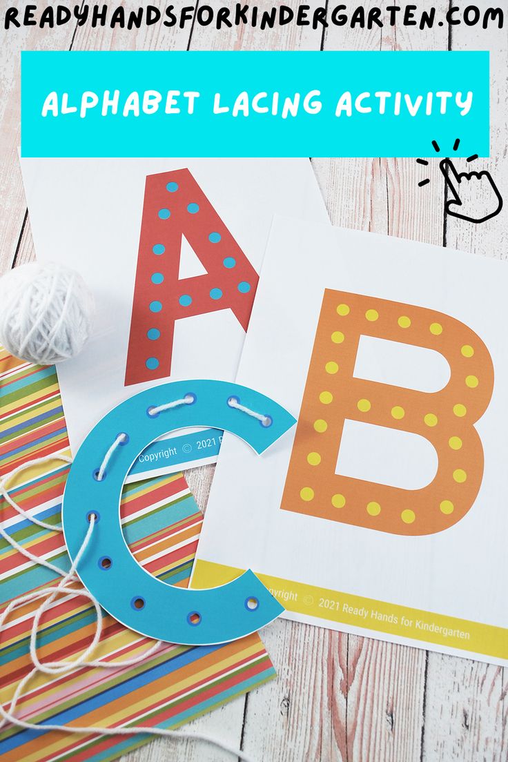 an alphabet and letter matching activity for kids to practice letters with yarn, scissors and paper