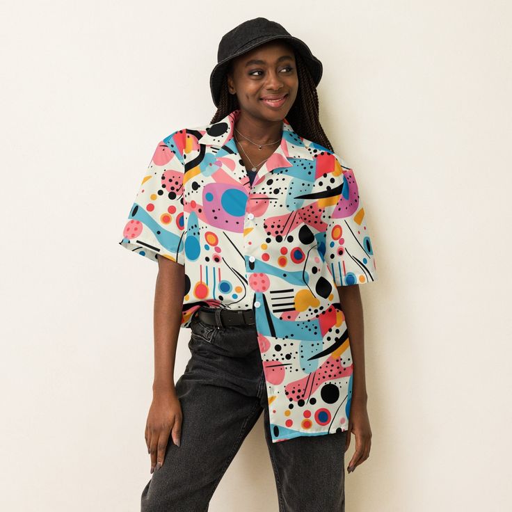 Meet your new favorite summer shirt! It exudes coolness both in terms of style and material. Plus, its featherlight and moisture-wicking material ensures comfort even on the hottest days. * 65% recycled polyester, 35% polyester * Fabric weight: 2.95 oz/yd² (100 g/m²) * Breathable and moisture-wicking material * Oversized fit * UPF50+ protection * Blank product components sourced from China This product is made especially for you as soon as you place an order, which is why it takes us a bit longe Trendy Printed Camp Shirt For Spring, Trendy Graphic Print Short Sleeve Shirt For Spring, Modern Relaxed Fit Camp Shirt For Summer, Trendy Short Sleeve Shirt With Graphic Print For Summer, Trendy Summer Short Sleeve Shirt With Graphic Print, Trendy Printed Short Sleeve Shirt For Spring, Modern Short Sleeve Shirt With Camp Collar For Summer, Trendy Camp Shirt With Printed Camp Collar, Retro Graphic Print Short Sleeve Shirt For Summer