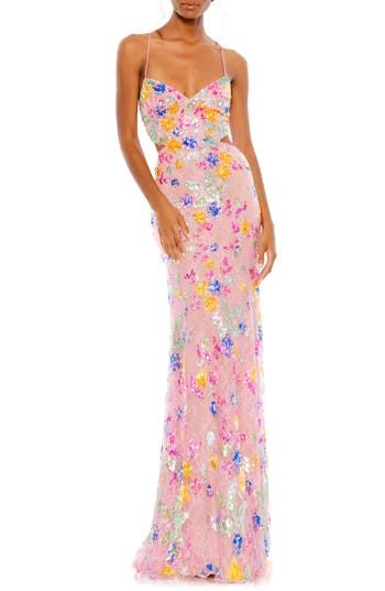 Turn heads at your next garden party in this spectacularly shiny gown adorned with sparkling sequins in pretty floral shapes and modern cutouts at the waist. 63" length V-neck Adjustable tie straps Lined 100% polyester Spot clean Imported Asian Owned/Founded Mac Duggal Prom, Sequined Gown, Body Hugging Dress, Pink Sequin Dress, Sheath Gown, Cute Prom Dresses, Column Gown, Romantic Lace, Mac Duggal