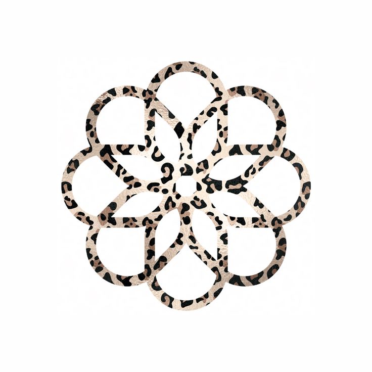 an animal print flower is shown on a white background with black and brown spots in the center