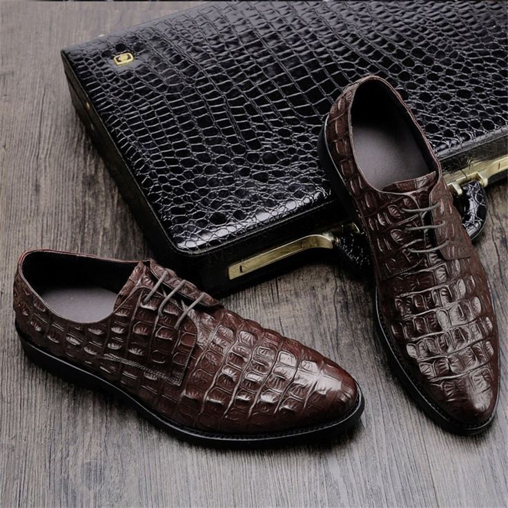 Introducing our Luxe Embossed Leather Oxford Brogues, the epitome of sophistication and comfort for the modern gentleman. With their timeless charm and refined pointed toe shape, these brogues effortlessly elevate any outfit, while the durable rubber outsole ensures stability on any surface. Customize your comfort with the lace-up closure and experience all-day support with the latex insole. Invest in these brogues and make a lasting impression wherever you go. Upgrade your shoe game and embrace the perfect fusion of style and functionality. Casual Business Attire, Oxford Brogues, Modern Gentleman, Casual Everyday, Travel Backpack, Shoe Game, Signature Style, Embossed Leather, Accessories Shop