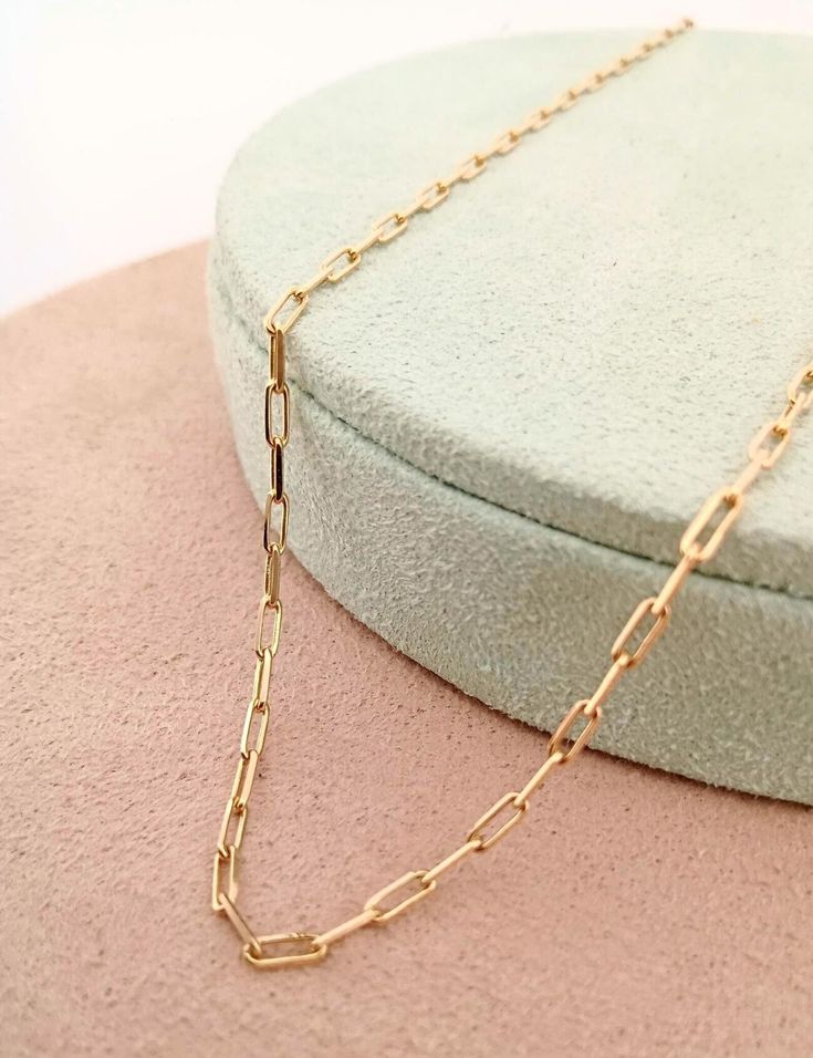 High quality paperclip necklace chain for everyday use. This minimalist design is hand-crafted with love and passion. * Free Express International Shipping NEXT BUSINESS DAY SHIPPING! PRODUCT DETAILS * The product is made of 100% 14k Solid Gold and it has a 14K or 585 stamp on item. (We don't sell filled or plated jewelry) * The package includes a gold certificate. * Every package comes in a gift box. * 14K gold indicates that the product is produced from 58% pure gold. * Chain thickness: 1.50 mm /0,059 inches(front look)  * Chain length: 40, 45, 50 cm/ 16, 18, 20 inches * Chain weight: 2.98 Gram for 20 inches * The product is yellow gold. Follow on Instagram - @pirlant My Web Site - https://www.pirlant.com.tr/ ORDER PROCESS * Available length: 50cm which fits most but if you need longer o Minimalist Paperclip Chain Necklace As Gift, Minimalist Paperclip Chain Necklace For Gift, Minimalist Paperclip Chain Necklace Gift, Minimalist Paperclip Necklace As Gift, Minimalist Paperclip Necklace For Gift, Paperclip Necklace With Delicate Chain For Gift, Dainty Paperclip Chain Necklace For Gift, Delicate Chain Paperclip Bracelet As Gift, Delicate Paperclip Chain Bracelet As Gift