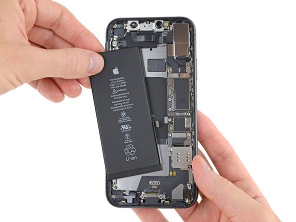 someone is removing the battery cover from their iphone's back side, with one hand