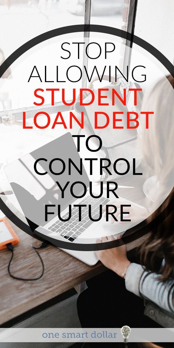 a woman sitting at a desk working on her laptop with the words stop allowing student loan debt to control your future