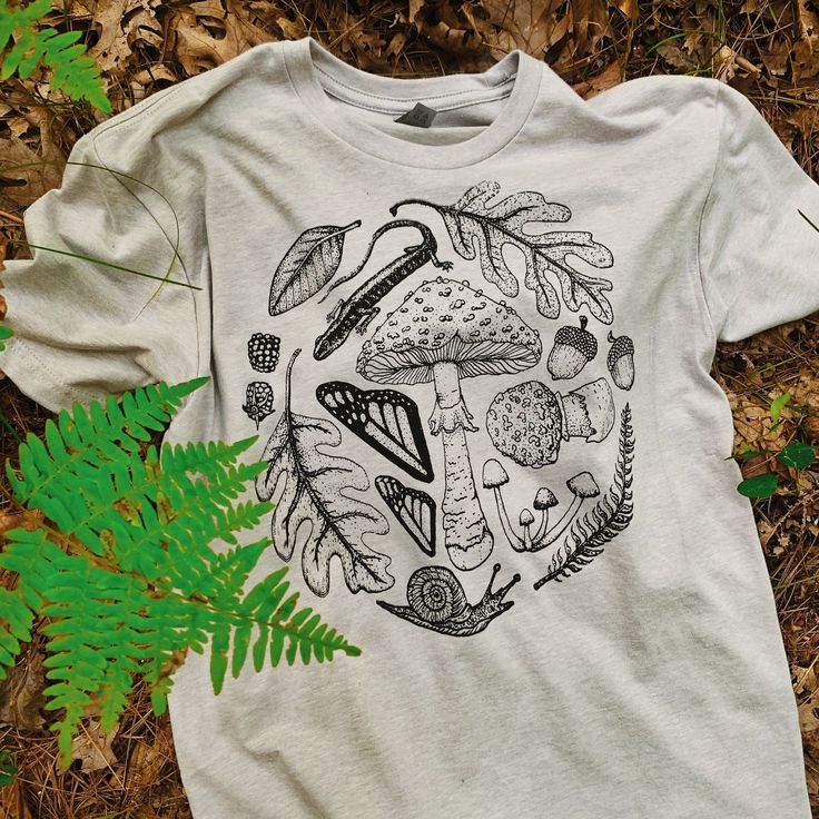 Forest Floor T-Shirt Heather Grey Tri-blend T-shirt With Screen Print, Heather Grey Graphic Print Cotton T-shirt, Gray Graphic Tee With Graphic Design, Heather Grey Cotton Graphic T-shirt, Heather Grey Tri-blend T-shirt With Graphic Print, Gray Cotton Shirt With Graphic Print, Gray Crew Neck Shirt With Sublimation Print, Heather Grey Graphic Tee With Graphic Print, Outdoor Cotton T-shirt With Sublimation Print