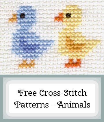 two cross - stitch ducks are standing next to each other