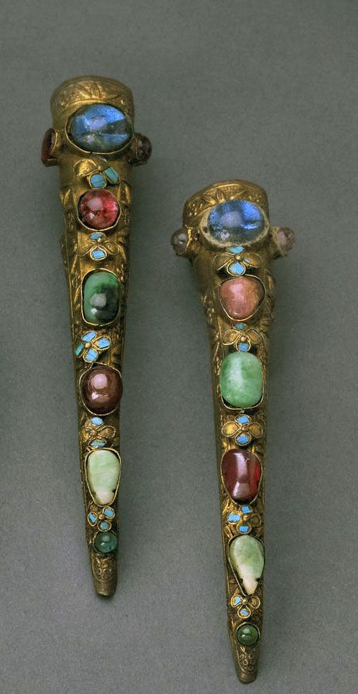 China | Pair of nail covers in gilt-washed metal mounted with colored glass and jade cabochons separated by tiny flowers covered in kingfisher feathers. | Late Qing Dynasty Qing Dynasty Jewelry, Nail Guards, Jewel Encrusted, Ancient Jewellery, Chinese Jewelry, Body Adornment, Ancient Jewelry, Ancient Artifacts, Ancient China