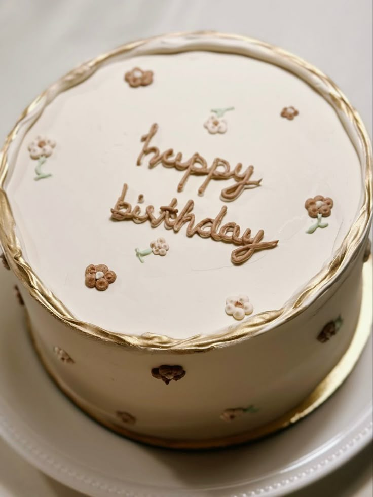 a birthday cake with the words happy birthday written on it