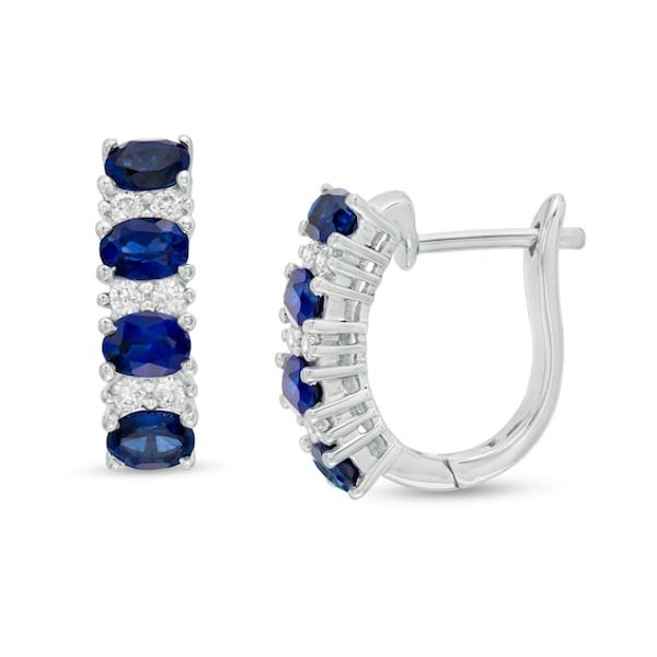 These fashion-forward gemstone and diamond hoop earrings are a jewelry box must-have. Crafted in 14K white gold, each earring features four 5.0 x 3.0mm oval-shaped bright blue sapphires alternating with duos of glistening diamonds. Captivating with 1/4 ct. t.w. diamond and a brilliant buffed luster, these earrings secure with hinged backs. Classic Oval Sapphire Diamond Earrings, Sapphire Oval Diamond Earrings, Oval Hallmarked Hoop Earrings In Fine Jewelry, Oval White Gold Hoop Earrings For Formal Occasions, Formal Oval Hoop Earrings With Diamond Accents, Oval Hoop Earrings With Diamond Accents For Formal Occasions, Oval Hoop Earrings With Diamond Accents For Formal Events, Formal Sapphire Diamond Oval Earrings, Formal Oval Sapphire Diamond Earrings