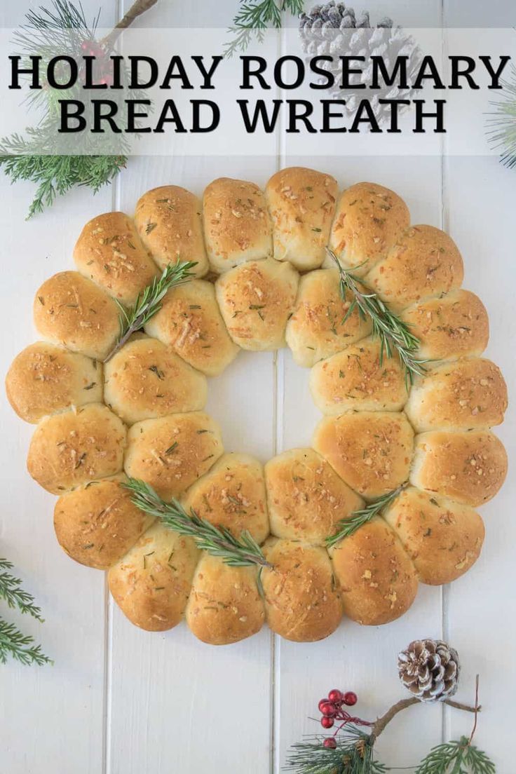 a holiday rosemary bread wreath on a white table