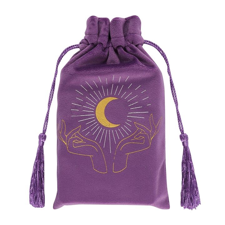 a purple bag with the moon and hands on it