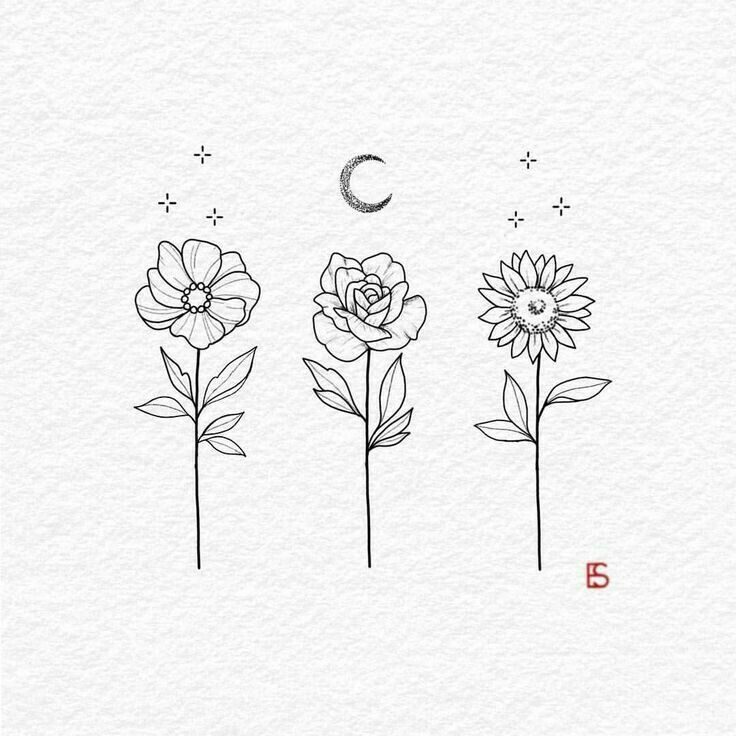 three flowers with the moon in the sky above them, and one flower is drawn on paper