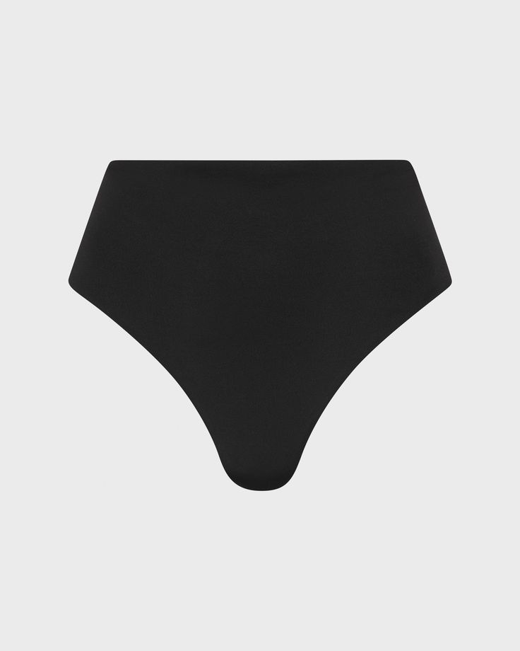 Based on our best-selling Poppy bikini bottom, Pippa is a supremely comfortable, high waisted bikini bottom with soft edges, however Pippa offers full bottom coverage. Made from our ultra-soft Italian Embodee™ fabric that with high shaping power. Pair with any black bikini tops in Embodee Fabric. For a high waisted bottom in Embodee™ fabric with a higher cut legline see Poppy. Luxury fabric sustainably made in Italy. High-cut Leg Beachwear Bottoms For Sunbathing, High Waist Seamless Tankini For Beachwear, Black Smoothing Shapewear Swimwear, Elastane Swimwear Briefs With Wide Waistband, Elastane Brief Bottoms For Pool, Elastane Pool Briefs, Beach Shapewear Swimwear Briefs, Beachwear Tankini With Wide Waistband, Swim Skirt With Wide Waistband