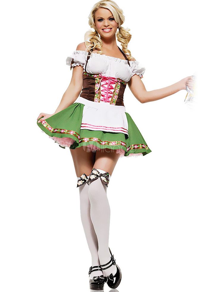 a woman dressed in a costume holding a beer