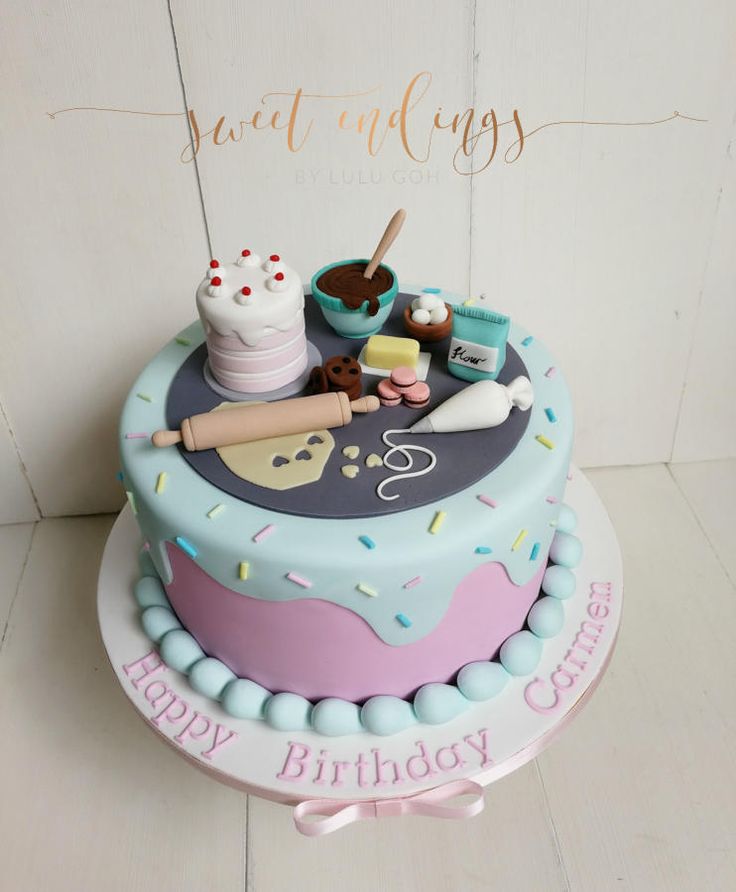 a birthday cake is decorated with fondant and sprinkles