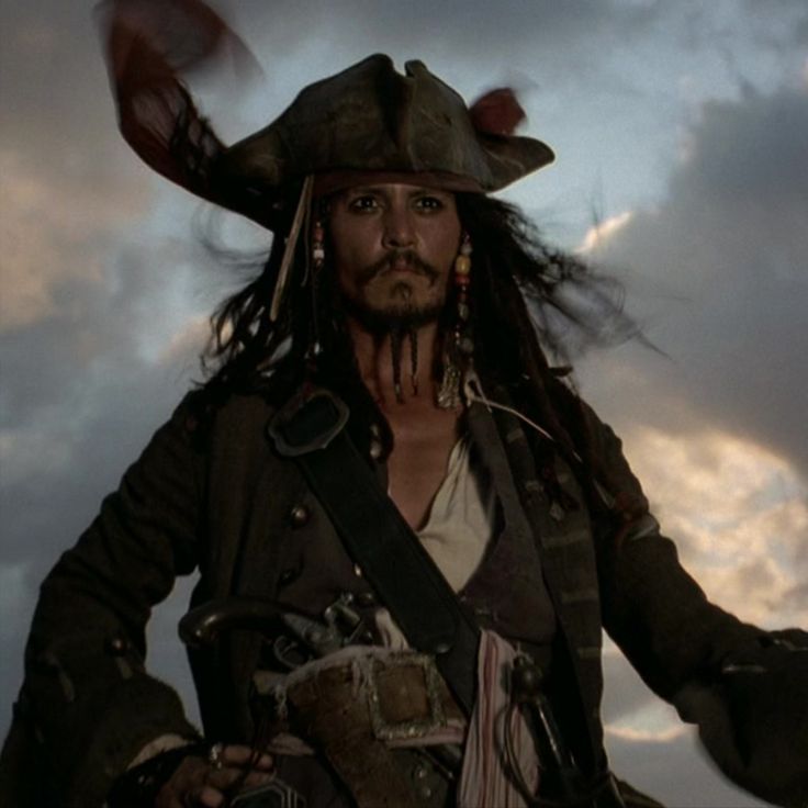 a man dressed as captain jack sparrow in the movie pirates of the carraige