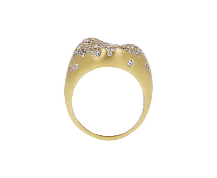 With its modern design and shimmering white diamonds, this Nada Ghazal ring is a playful take on the traditional cocktail ring. The three dimensional 18K yellow gold ring face is encrusted in a surface of sparkling, round white diamond pavé and sits at the center of the 18K yellow gold band. As a middle finger ring it will command attention, but it could also be worn as an alternative to the traditional engagement ring for someone with an edgy, modern style. 18K yellow gold ring face : just unde Gold Rings With Pave Setting For Party, Dazzling Yellow Gold Rings For Party, Dazzling Yellow Gold Party Rings, Yellow Gold Diamond Rings For Party, Party Diamond Ring With Accents In Yellow Gold, Yellow Gold Diamond Ring With Accents For Parties, Party Yellow Gold Diamond Ring With Accents, Party Diamond Ring In Yellow Gold, Party Cubic Zirconia Diamond Ring In Yellow Gold