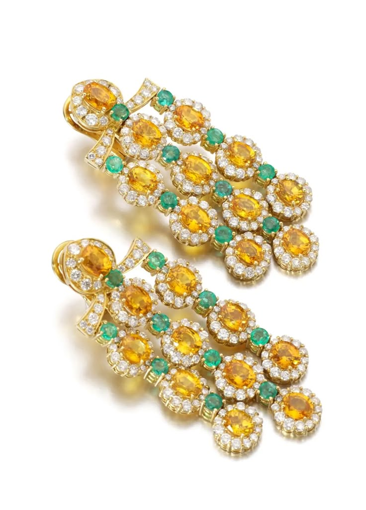 For Sale on 1stDibs - Stunning chandelier earrings set with circular-cut citrine and emeralds, and accented with brilliant-cut diamonds. With collapsible post and clip fittings. Bvlgari High Jewelry, Royal Earrings, Emerald And Diamond Earrings, Diamond Chandelier Earrings, Diamond Chandelier, Gold Chandelier Earrings, Cocktail Earrings, 22k Gold Jewelry, Citrine Jewelry