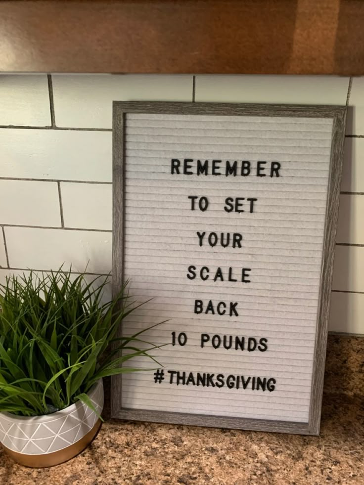 a sign that says,'remember to set your scale back 10 pounds thanksgiving '