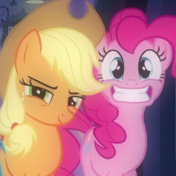 two pinkie ponies standing next to each other