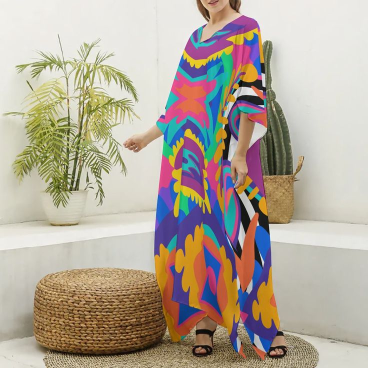 **Please be aware that this item is coming from our international production warehouse and may take up to 2 weeks to receive, even with expedited shipping. ** The robe is made of silk like fabric. It is soft, comfortable, close to the skin, and the hem drops naturally. Fabric: Imitation Silk(97% polyester and 3% spandex) Regular fit V-neck Fabric weight: 90g/m² Care Instruction: machine wash cold with similar colors, do not bleach, tumble dry low, do not iron, do not dry clean. Size Guide inch S Multicolor Flowy V-neck Kaftan, Silk V-neck Summer Robe, Casual Multicolor V-neck Kimono, Bohemian V-neck Robe For Loungewear, Spring Silk V-neck Robe, Spring Silk Robe With V-neck, Multicolor V-neck Kaftan For Vacation, Spring Silk V-neck Kaftan, Free Size V-neck Kimono For Spring