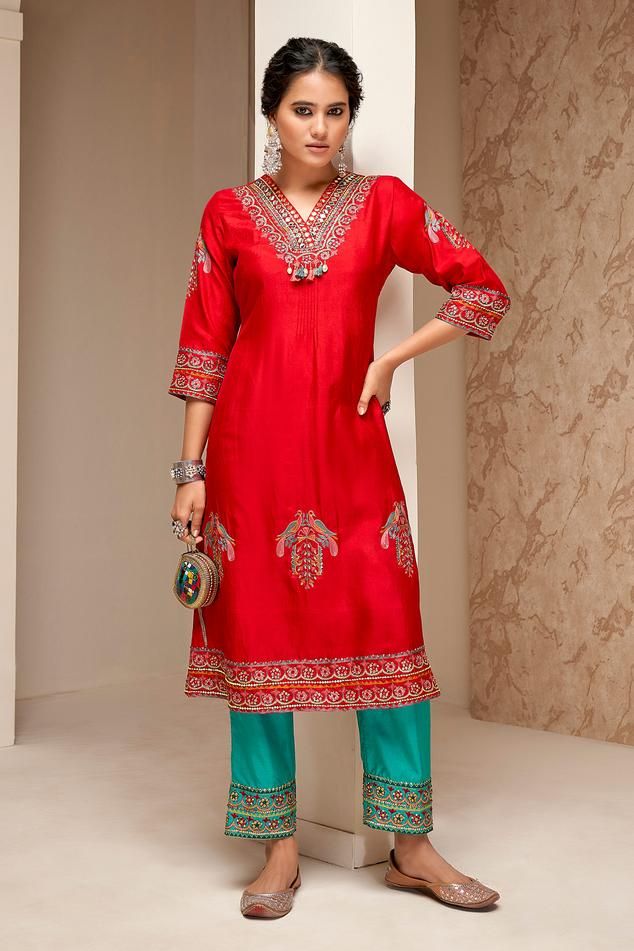 Red cotton silk kurta with aari, resham, zari, bead, sequin embroidery in peacock pattern. Paired with flared pant.
Components: 2
Pattern: Embroidery
Type Of Work: Aari, resham, zari, bead, sequin
Neckline: V neck
Sleeve Type: Three quarter
Fabric: Cotton Silk
Color: Red
Other Details: 
Weight: Approx 1000 gms
Length:
Kurta: 44 inches
Pant: 36 inches
Model height: 5 ft. 7 inches, wearing size S
Note: 
All the jewellery worn by the model is not for sale
Bag shown in the image is not for sale
Occa Peacock Pattern, Silk Kurta, Sequin Embroidery, Pattern Embroidery, Sequins Embroidery, Silk Embroidery, Pant Set, Set For Women, Cotton Silk