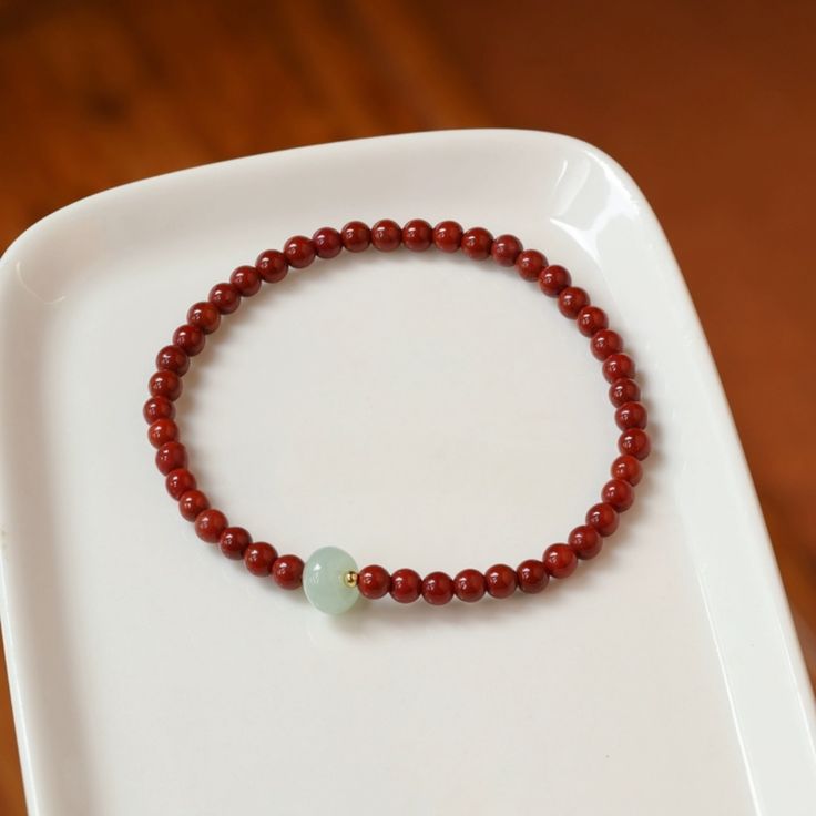 Introducing our exquisite Jade Bracelet With Red Beads. Crafted with precision and care, this bracelet combines the beauty of green jade with the vibrancy of red agate beads. Red Carnelian Beaded Bracelets With Round Beads, Red Carnelian Beaded Bracelet With Round Beads, Red Carnelian Round Beads Bracelet, Red Carnelian Beaded Bracelets With Gemstone Beads, Carnelian Round Beads Bracelet For Gift, Elegant Red Carnelian Beaded Bracelets, Red Carnelian Bracelets With 8mm Beads, Red Beaded Bracelets For Meditation 8mm, Red Bracelets With 8mm Beads For Meditation