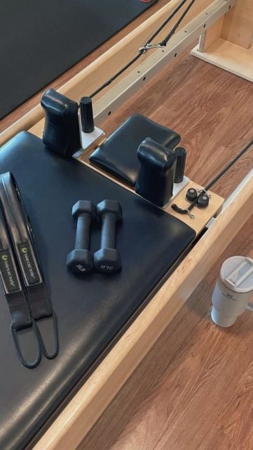 a close up of an exercise equipment on a wooden floor