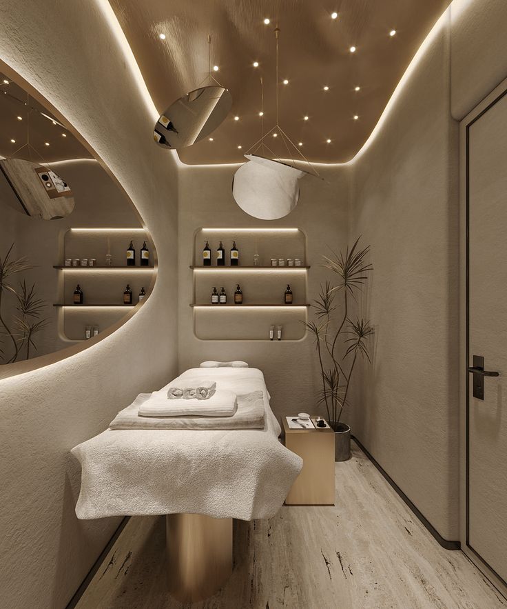 a spa room with white towels and lights on the ceiling, in front of a mirror