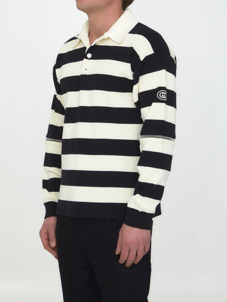 Ivory and black striped knit cotton polo with detachable zipped sleeves. It features pointed collar, front buttoned placket and GG patch on left sleeve. The model is 188cm tall and wears size M. Size nationality: INTGender: MenMaterial: 100% COTTONColor: BeigeMade in: ITProduct ID: 4273612 724708 XKCV0 9207*Import tax/duty will be calculated at checkout (If applicable) Gucci Outlet, Detachable Sleeves, Cotton Polo, Knit Cotton, Striped Knit, Black Stripes, Models, Gucci, Collar