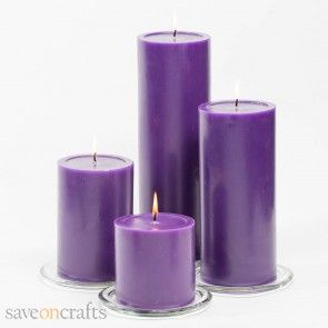 three purple candles sitting next to each other on a glass plate with the words quick candles written below them