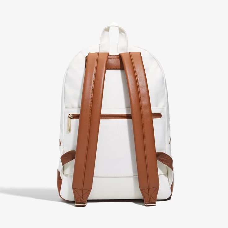 Designed for convenience and style, this classic backpack has all the things mamas, dads and babes need for life on the go. Preppy Standard Backpack For Daily Use, White Softback Backpack For On-the-go, Travel Diaper Bag Backpack With Adjustable Strap, Travel Diaper Bag With Adjustable Strap, Classic Large Capacity Backpack For School, Classic School Backpack With Luggage Sleeve, Classic School Backpack With Large Capacity, Classic Large Capacity School Backpack, Classic School Backpack With Adjustable Strap