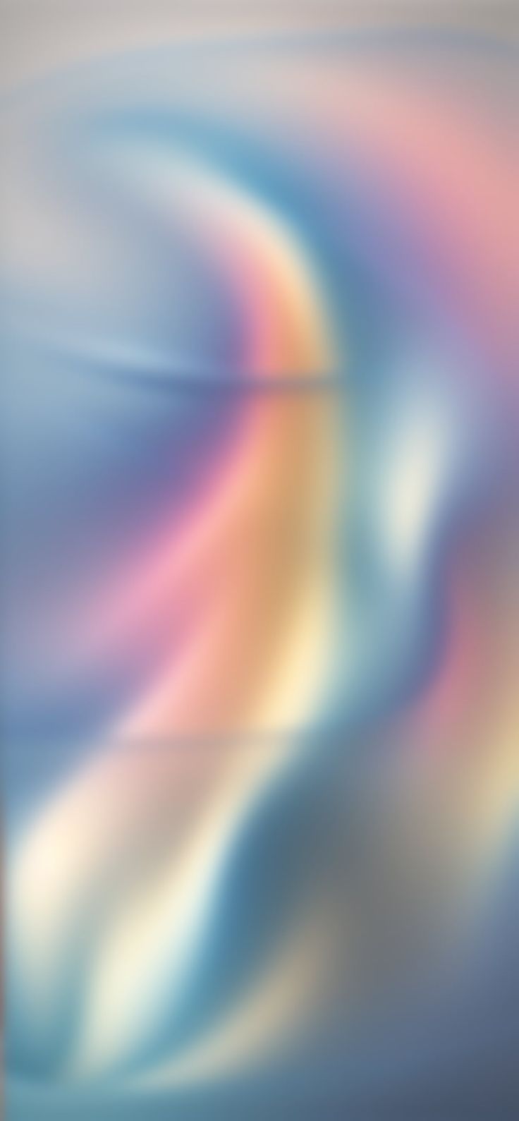 an abstract blurry background with blue, pink and yellow colors