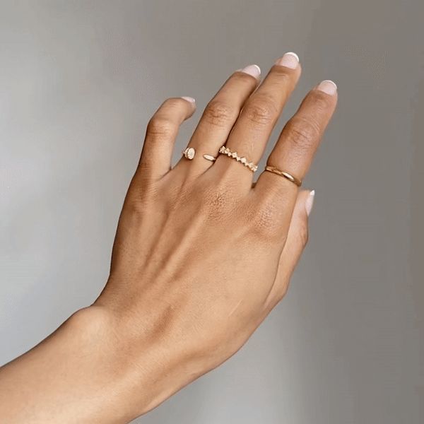 This minimalist cluster eternity ring is easy to wear everyday in any occasion and makes for gift. Set with beautiful cubic zirconia stones. Meant to be worn alone or stacked. - Made in gold vermeil: a thick 18k gold layer on 925 sterling silver.- Cubic zirconia gemstones- Band thickness: 3 mm. If you are in between sizes, we recommend sizing up. Ring Size Chart Minimalist Diamond Eternity Band For Everyday, Diamond Minimalist Everyday Eternity Band, Minimalist Everyday Diamond Eternity Band, Dainty Diamond Eternity Band For Everyday, Minimalist Diamond Eternity Band, Everyday Dainty Diamond Eternity Band, Dainty Everyday Diamond Eternity Band, Yellow Gold Stackable Midi Rings With Cubic Zirconia, Stackable Yellow Gold Midi Rings With Cubic Zirconia