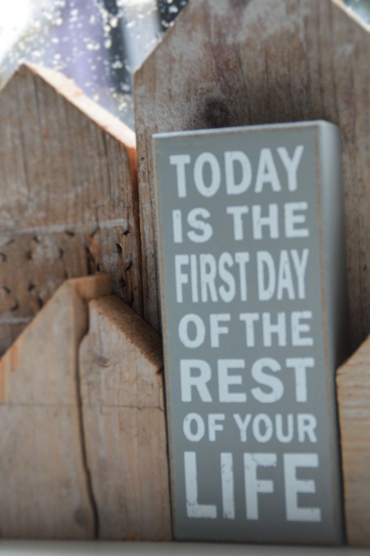 a sign that says today is the first day of the rest of your life