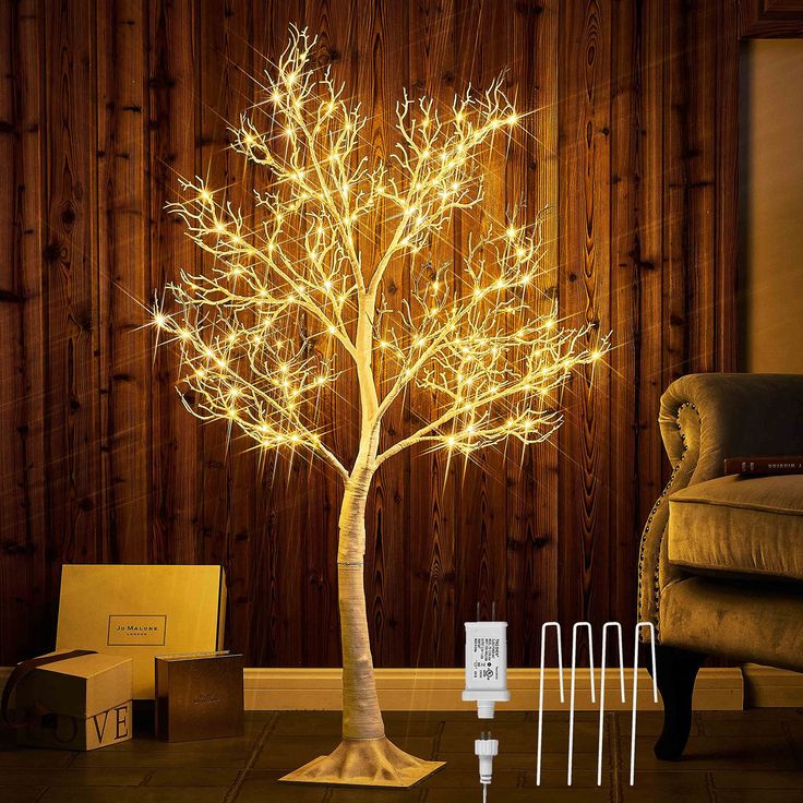 PRICES MAY VARY. 【HOME DECOR】: Totally 4FT high with full white lifelike twigs, this pre lit twig tree, create an elevated natural holiday scene 【EXQUISITE TEXTURE】: Hand crafted with vivid tree bark finish over the tree trunk and base gives it a natural woodland feel 【WIDELY USE】: All-weather design is made for outdoor yard, entryway porch decor. A special holiday display for Easter, Thanksgiving, Christmas fireplace, kitchen, living room, party decor 【DIY BRANCHES】: Flexible yet sturdy branche Lighted Trees Indoor, Pre Lit Twig Tree, Tree With Fairy Lights, Living Room Party Decor, Diy Branches, White Twig Tree, String Lights Inside, Fairy Lights In Trees, Entryway Porch