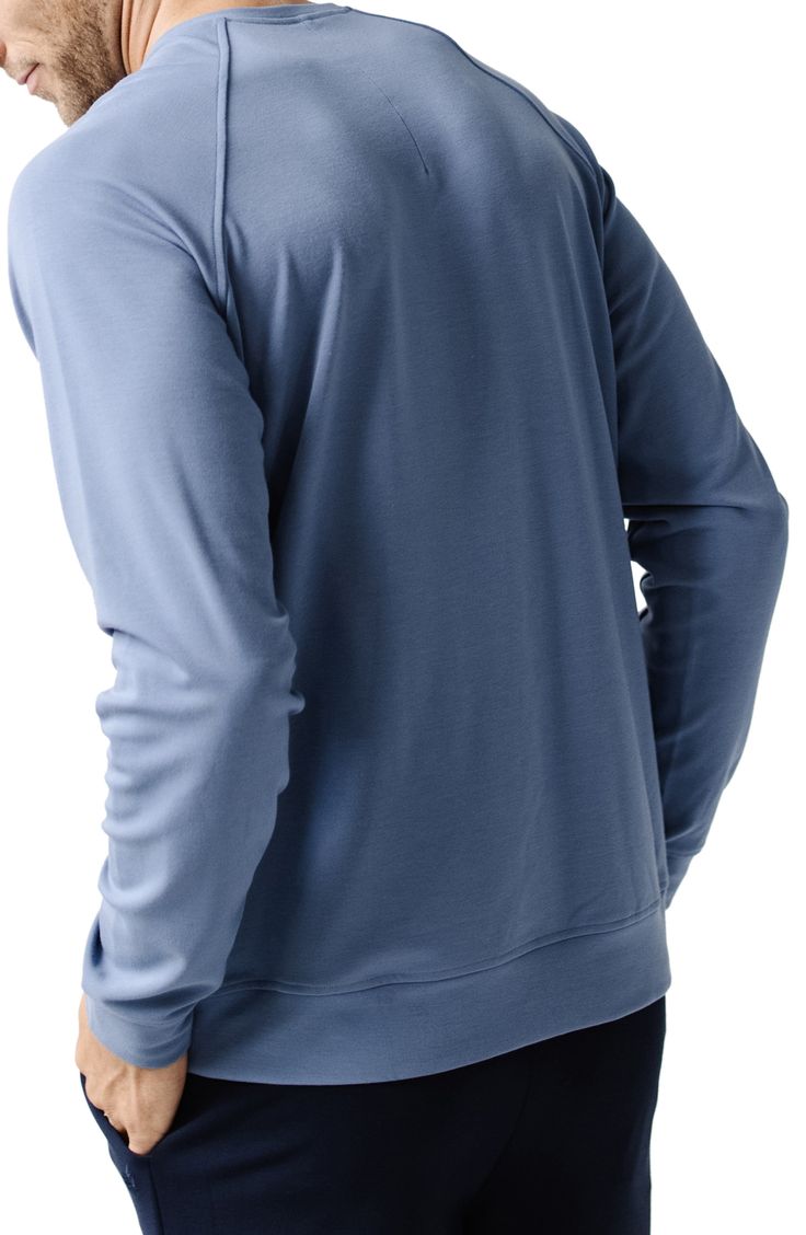 Soft, breathable and all-day comfortable, this stretchy crewneck sweatshirt wicks away moisture and makes a great go-to whether you're active or relaxing. Crewneck Moisture-wicking fabric engineered for dryness and comfort 70% viscose, 26% acrylic, 4% spandex Machine wash, tumble dry Imported Casual Go-dry Sweatshirt For Sports, Casual Track Jacket With Thumbholes For Sports, Relaxed Fit Long Sleeve Sports Sweats, Athleisure Long Sleeve Sweatshirt With Comfortable Fit, Athleisure Long Sleeve Sweatshirt, Comfortable Long Sleeve Athleisure Sweatshirt, Comfortable Crew Neck Sports Top, Stretch Crew Neck Sweater In Athleisure Style, Athleisure Crew Neck Tops For Layering