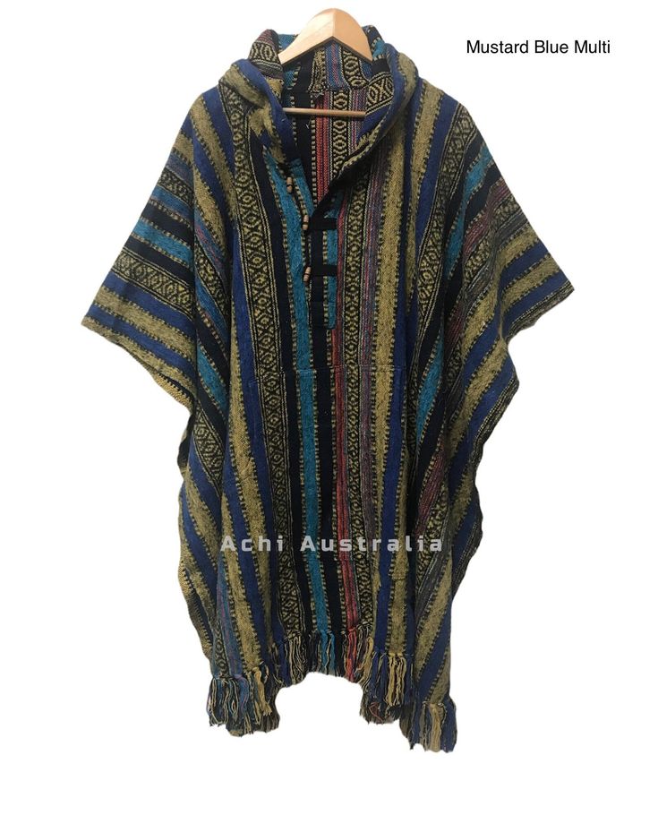 💯% Cotton Handloomed in Nepal Ponchos have been a stable part of festival life for many years. They offer great warmth, are very comfortable and come in many colours to accommodate most peoples tastes. We are proud to bring you our thick weave cotton unisex ponchos that are handmade in Nepal. An allrounder all season outdoor gear for surfing festivals hunting and camping for little colder weather. This poncho have hoodie and front pocket to carry your keys mobile and wallets when you are out and inside ties to secure the poncho. Measurement:-   Width : 116cm (approx) Length : from shoulder 100cm approx) Weight:1.10kg Features:- * Handmade in Nepal  * 💯% Heavy duty cotton fabric  * Opened sides with cotton tie ups * Pocket in the front centre * One size fits most people  CARE: Hand wash i Traditional Cotton Poncho For Fall, Casual Blue Cotton Poncho, Casual Multicolor Cotton Poncho, Casual One Size Festival Poncho, Casual Brown Poncho For Festival, Casual One Size Poncho For Festivals, Traditional Multicolor Winter Poncho, Oversized Cotton Bohemian Poncho, Traditional Multicolor Woven Poncho