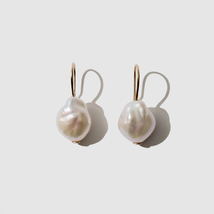 GALATEA EARRINGS | Beatricevalenzuela.com White Drop Pearl Earrings For Everyday Elegance, Teardrop Akoya Pearl Drop Earrings, Akoya Pearl Drop Teardrop Earrings, Elegant Handmade Pearl White Pearl Earrings, Timeless White Earrings With Pearl Charm, Timeless Pearl White Earrings For Gift, Akoya Pearl Drop Earrings With Ear Wire, Luxury Single Pear-shaped Earring, Baroque Pearl Earrings For Pierced Ears